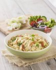 Risotto with chicken in bowl — Stock Photo