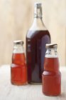 Rhubarb juice in bottles — Stock Photo