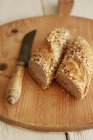 Halved wholegrain baguette — Stock Photo