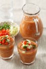Gazpacho in jar and in glasses — Stock Photo