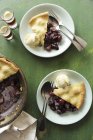 Grape cobbler with vanilla ice cream — Stock Photo