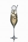 Champagne splashing out of a glass — Stock Photo