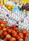 Fresh tomatoes with garlic — Stock Photo