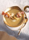 Closeup view of peach soup with prawns — Stock Photo