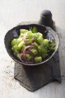 Cucumber salad with red onions and dill — Stock Photo