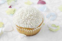 Cupcake with sugar pearls — Stock Photo