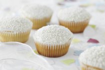 Cupcakes decorated with sugar pearls — Stock Photo