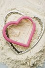 Heart-shaped baking tin — Stock Photo