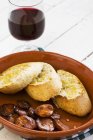Pinchos with chorizo with wine — Stock Photo