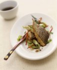 Sea bass with vegetables — Stock Photo