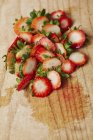 Cut-off strawberry tops — Stock Photo