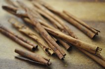 Cinnamon sticks on a wooden board — Stock Photo