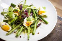 Asparagus salad with bacon and eggs — Stock Photo