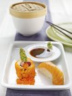 Nigiri sushi with salmon and maki with asparagus — Stock Photo