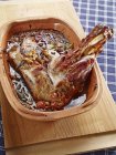 Shoulder of lamb cooked in clay pot — Stock Photo