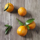 Fresh Tangerines with leaves — Stock Photo