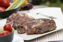 Sliced grilled beef steak — Stock Photo