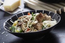 Fried noodles with pork — Stock Photo
