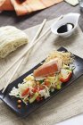 Noodles and salmon fillet — Stock Photo