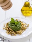 Pesto homemade rye pasta — Stock Photo