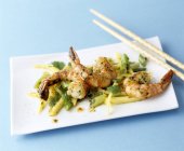 King prawns with beans and coriander — Stock Photo