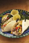 Tacos with chicken on plate — Stock Photo