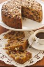 Fruit cake with cup of tea — Stock Photo