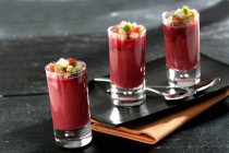 Gazpacho with beetroot in tall glasses — Stock Photo