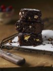 Stack of fresh baked chocolate brownies — Stock Photo