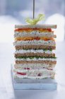 Stack of sandwiches on skewer — Stock Photo