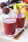 Smoothie in glasses with spoon — Stock Photo