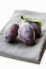 Bunch of fresh plums — Stock Photo