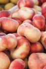 Organic Saturn Peaches — Stock Photo