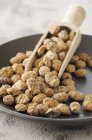 Tiger nuts on a plate — Stock Photo