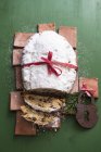 Christmas stollen tied with ribbon — Stock Photo
