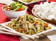 Fried noodles with chicken — Stock Photo