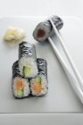 Maki sushi with tuna, salmon and cucumber — Stock Photo