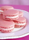 Pink macaroons on plate — Stock Photo