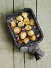 Roasted potatoes with garlic — Stock Photo