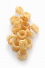 Potato crisps on white background — Stock Photo