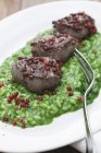 Parsley risotto with fillets — Stock Photo