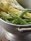 Wax beans and pea pods — Stock Photo