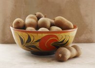 Tamarinds in rustic bowl — Stock Photo