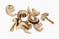 Dried sliced porcini mushrooms — Stock Photo