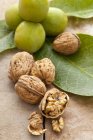 Walnuts on wooden surface — Stock Photo