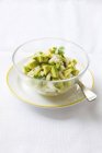 Avocado salad with herbs in bowl — Stock Photo