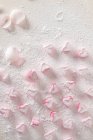 Marshmallow hearts on white — Stock Photo