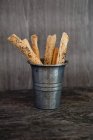 Pastry straws in container — Stock Photo