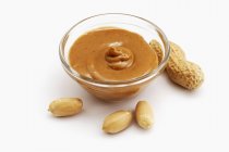 Peanut pure in bowl — Stock Photo