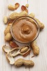 Peanut pure in bowl — Stock Photo